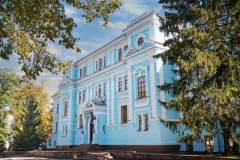 головна