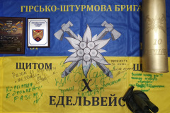 головна
